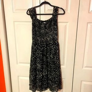 Smocked dress with leaf print